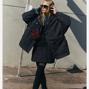 NWT. Retail $248. FREE PEOPLE Size XS/S 
Lightweight insulated jacket in black